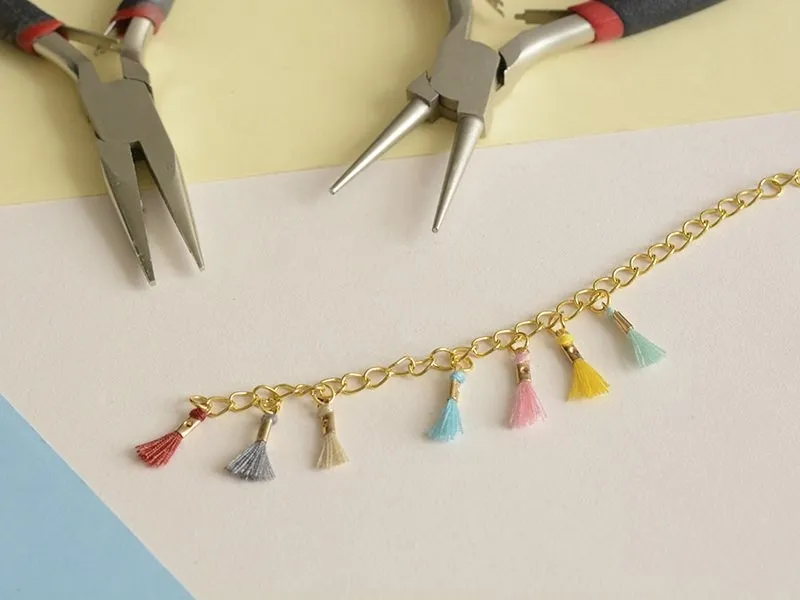 Acheter breloque mini-pompon bleu roi en ligne