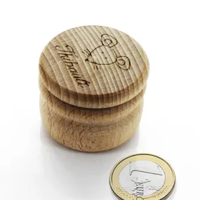 Boîte à dents ronde en bois gravée